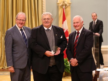 Donald F. Ross receives on behalf of his team, the 2014 Public Service Award of Excellence 2014 for Exemplary Contribution Under Extraordinary Circumstances. The members of the Transportation Safety Board's Lac-Mégantic Investigation Team demonstrated extraordinary commitment and perseverance in responding to the devastating July 2013 train derailment. In the face of horrific tragedy – the subsequent fire killed 47 people and destroyed Lac-Mégantic's downtown core – the team members worked tirelessly for four weeks in very difficult and dangerous conditions. They collaborated with the community, with local and provincial governments and with numerous partners to provide answers to the grieving community and to the Canadian public. The team's findings and recommendations will provide indispensable guidelines for improving rail safety across the country and throughout North America.