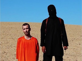 This image made from video posted on the Internet by Islamic State militants and provided by the SITE Intelligence Group, a U.S. terrorism watchdog, on Saturday, Sept. 13, 2014, purports to show British aid worker David Haines before he was beheaded. The video emerged hours after the family of Haines issued a public plea on Saturday urging his captors to contact them. The 44-year-old Haines was abducted in Syria in 2013 while working for an international aid agency.