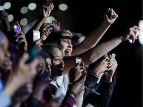 Fans of J. Cole enjoy the show as Ottawa Folk Festival continues for the third day at Hog's Back Park.