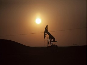 FILE - In this March 2, 2013 file photo, a view of an oil field under control of Kurdish militias near the town of Deriq, in a Kurdish area of Syria, near the border with Iraq. The Islamic State militants, who once relied on wealthy Persian Gulf nations for money, have become a self-sustaining financial juggernaut, earning more than $3 million a day from oil smuggling, human trafficking, theft and extortion, according to U.S. intelligence officials and private experts. The group, which has taken over large sections of Syria and Iraq, controls as many as 11 oil fields in both countries, analysts say. It is selling oil and other goods through generations-old smuggling networks under the noses of some of the same governments it is fighting: Kurdish-controlled northern Iraq, Turkey and Jordan.