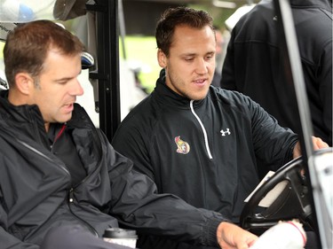 Frederik Claesson (right) seemed to be getting tips on how to drive the cart. Hockey players, coaches and some happy fans all got out their clubs for the Ottawa Senators annual golf tournament, held Wednesday, Sept. 17  at the Rideau View Country Club in Manotick.