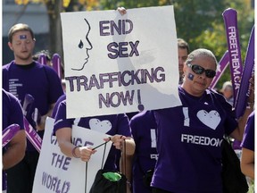 Freedom Walk participants near Convention Centre in downtown Ottawa, Saturday.