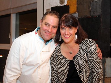 From left, Farm Boy executive chef Joshua Drache with Sheila Whyte, owner of Thyme & Again Catering, at a Hospice Care Ottawa reception sponsored by the two businesses on Wednesday, Sept. 17, 2014, at the penthouse level of 700 Sussex Drive.