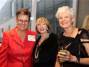 From left, Jane Panet, honorary co-chair of Hospice Care Ottawa's Homes for the Holidays 2014, with Earlene Hobin and Carol Lange at a fundraising reception held Wednesday, Sept. 17, 2014, at the penthouse level of 700 Sussex Drive.