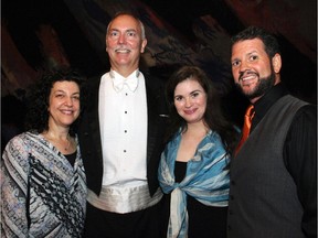 From left, pianist Judith Ginsburg and conductor Tyrone Paterson with Tosca lead singers Michele Capalbo and David Pomeroy at the National Arts Centre on Saturday, Sept. 6, 2014, for the opening night party. Ginsburg was called to act on stage after one cast member become ill.