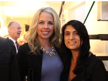 From left, Sarah Grand and Monica Singhal at a Hospice Care Ottawa reception held at the penthouse level of 700 Sussex Drive on Wednesday, Sept. 17, 2014.