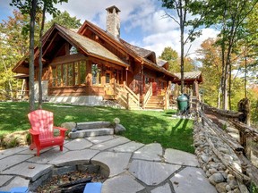 Eyebrow dormers and a cascade of roofs create the mystical quality that Matt Davidson's homes are famous for.