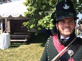 George Muggleton, a Parks Canada employee, presents an exhibition Friday, Sept. 12, 2014 on the War of 1812 at Fort McHenry in Baltimore.