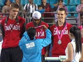 Goalkeeper Liam Manning, left, and defender Braedon Muldoon, right,  retired from ice hockey, but they took their skills with them to concentrate on field hockey. The members of the five-year-old Nepean Nighthawks Field Hockey Club were selected to represent Canada in the new game of hockey 5s at the second Youth Olympic Games and they shocked the world by helping Canada win a silver medal.