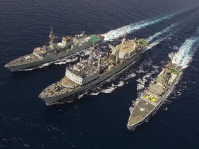 Canadian ships in the Gulf of Oman in 2002: from right to left HMCS Algonquin, HMCS Protecteur and HMCS St-Johns.