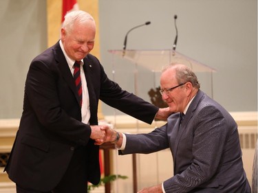 His Excellency the Right Honourable David Johnston, left, Governor General of Canada shakes the hand of Mr. Wayne G. Wouters, Clerk of the Privy Council, Secretary to the Cabinet and Head of the Public Service at Rideau Hall on Tuesday, September 16, 2014.