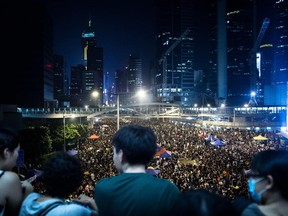 Pro-democracy demonstrators gather for the third night in Hong Kong on September 30, 2014.
