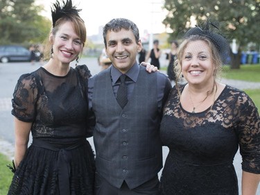 Janet Wilson, left, and Vito Pilieci, centre, with his wife, Cheryl, are photographed at the Harvest Noir picnic.