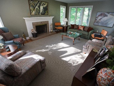 The home was designed by Ottawa architect Robin Fife in the ’80s. Shown is the living room.