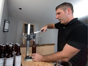Joe Rancourt is an avid homebrewer who is entering the Beau's Oktoberfest Homebrew competition this year. Last year he won people's choice and this year he is hoping to win a chance to brew one of his beers on a commercial scale with Beau's All Natural Brewing Company.  (Wayne Cuddington/Ottawa Citizen)