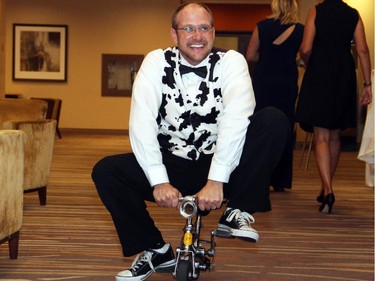 Jon Lockhart entertained guests on his mini bike at the Abracadabra: A Night of Magic and Medicine Gala hosted by the University of Ottawa's Faculty of Medicine on Saturday, Sept. 27, 2014, at the Westin Hotel. (