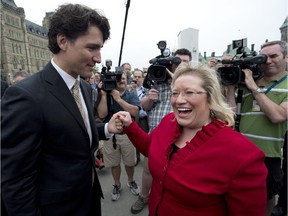 Liberal leader Justin Trudeau welcomes Liberal MP for Labrador Yvonne Jones to Parliament Hill Wednesday May 22, 2013 in Ottawa. Jones won a recent federal byelection in Labrador.