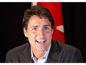 Liberal Leader Justin Trudeau speaks during a media availability at the federal Liberal Party's summer caucus meeting in Edmonton on Tuesday, Aug. 19, 2014.