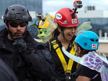 Kalpana Phansalker is all giddy as she and her friends dressed as fairy princesses prepare to rappel from the top of the Morguard Building at 280 Slater Street in the 5th annual Drop Zone Ottawa event which raises money for Easter Seals. September 22, 2014.
