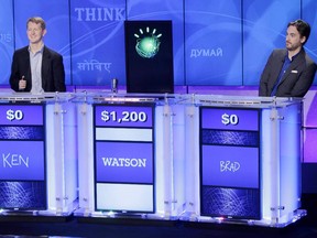 IBM's Watson cloud-computing system defeated Jeopardy superstars Ken Jennings, left, and Brad Rutter on live television in 2011.