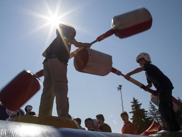 Kids joust at the Ottawa Senators Fan Fest at Canadian Tire Centre, Saturday, Sept. 27, 2014.
