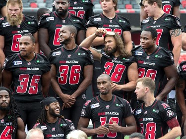 Linebacker James Green brushes his hair to look his best as the Ottawa Redblacks had their official team photos taken at TD Place.