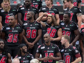 Linebacker James Green brushes his hair to look his best as the Ottawa Redblacks had their official team photos taken at TD Place.