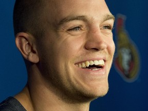 Ottawa Senators defenceman Mark Borowiecki speaks to reporters during a media availability in Ottawa on Monday, August 18, 2014.