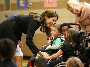 Crown Princess Mary with children of Centennial Public School after the WITS swearing in ceremony in Ottawa. WITS is an anti-bullying program for primary students.