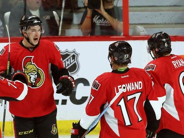 Ottawa Senators forward Matt Puempel (26) celebrates his goal against the Toronto Maple Leafs with forwards David Legwand (17) and Bobby Ryan (6) during second period NHL hockey pre-season action in Ottawa on Wednesday, September 24, 2014.