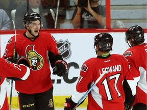 Ottawa Senators forward Matt Puempel (26) celebrates his goal against the Toronto Maple Leafs with forwards David Legwand (17) and Bobby Ryan (6) during second period NHL hockey pre-season action in Ottawa on Wednesday, September 24, 2014.