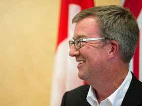 Mayor Jim Watson announces new campaign policies at a luncheon in Ottawa on Friday.