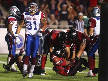 Winston Venable #31 of the Montreal Alouettes reacts after Jonathan Williams #23 of the Ottawa Redblacks scores a second quarter touchdown during a CFL game at TD Place Stadium on September 26, 2014.