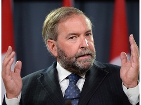 NDP Leader Tom Mulcair speaks a press conference at the National Press Theatre on Wednesday, Aug 27, 2014. Mulcair intends to start this fall nailing down some key planks in the NDP's election platform, a full year before the next scheduled federal vote.