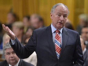 Defence Minister Rob Nicholson answers a question during Question Period in the House of Commons on Parliament Hill in Ottawa, Thursday Sept. 18, 2014 .