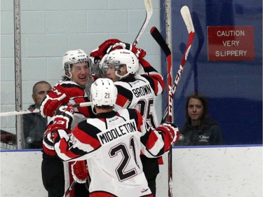 Ottawa 67's celebrate a goal during pre-season junior hockey action at the Nepean Sportsplex in Ottawa, Saturday, September 6, 2014.