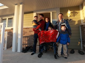 The Caceres family was one of several to receive a Habitat for Humanity home last year. Their bungalow was custom designed around the special needs of their daughter.
