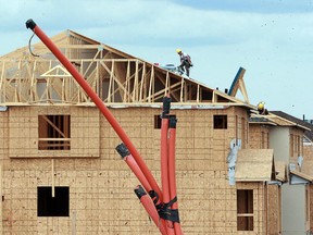 CMHC says new home construction fell to 330 units in May, down from 906 starts in May 2014.