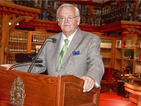 Speaker of the Senate Noel Kinsella (shown here in the Library of Parliament).