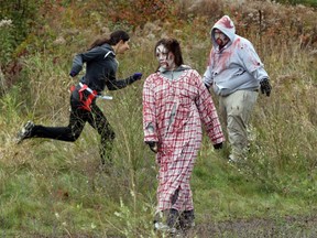 Runners dodge zombies at the 2013 Rattle Me Bones Ottawa Hospital fundraiser event. The event has been cancelled for 2014 due to organizational issues.