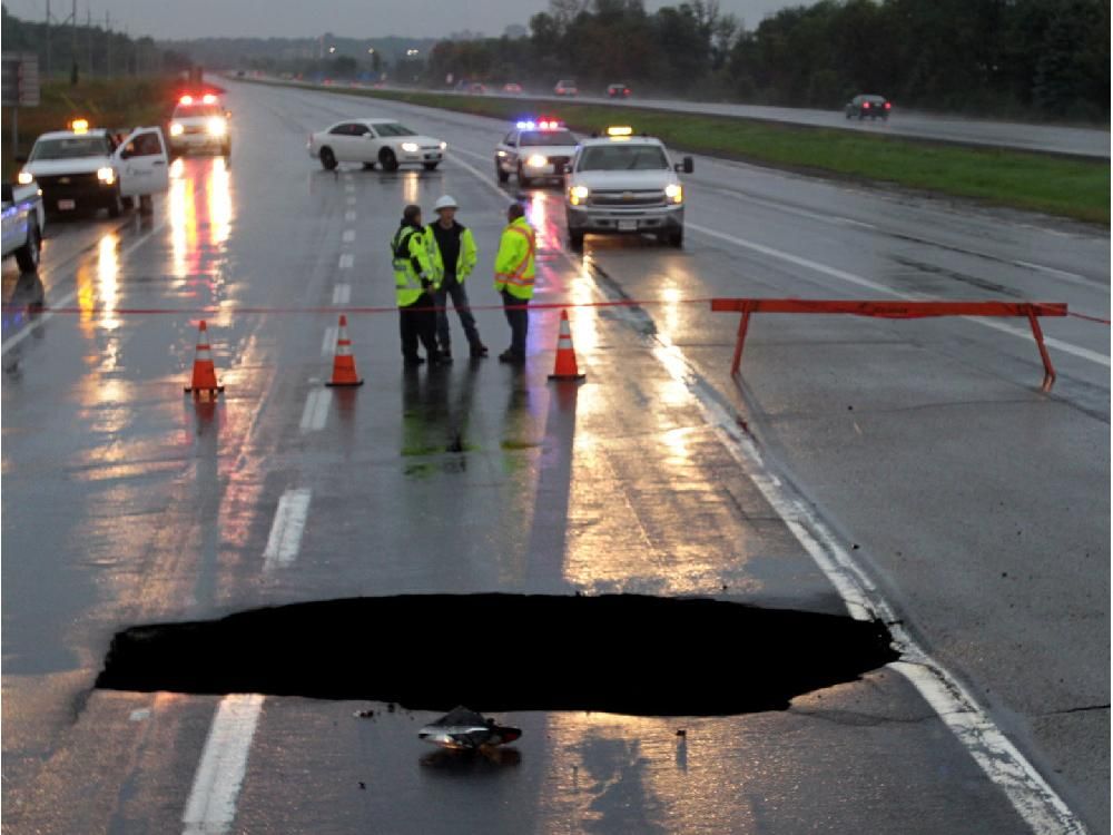 Sinkhole ‪ Highway 174 sinkhole driver sues city for more than half
