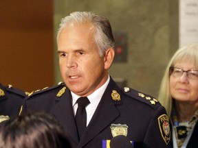 Ottawa police Chief Charles Bordeleau speaks to reporters at police headquarters in Ottawa on Sunday, Sept. 28, 2014 following the death of Staff Sgt. Kal Ghadban.