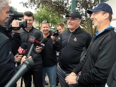 Ottawa Senators Head Coach, Paul MacLean (second from right) and Bell VP, Gary Cameron, joke around with the media before play begun. Hockey players, coaches and some happy fans all got out their clubs for the Ottawa Senators annual golf tournament, held Wednesday, Sept. 17  at the Rideau View Country Club in Manotick.