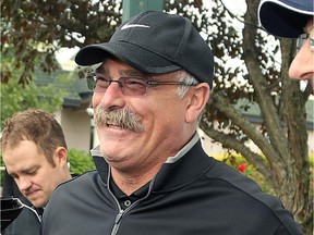 Ottawa Senators Head Coach, Paul MacLean (second from right) and Bell VP, Gary Cameron, joke around with the media before play begun. Hockey players, coaches and some happy fans all got out their clubs for the Ottawa Senators annual golf tournament, held Wednesday at the Rideau View Country Club in Manotick. (Julie Oliver / Ottawa Citizen)