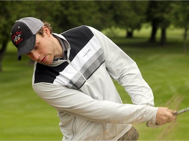 Ottawa's Bobby Ryan digs one out of the bunker for the cameras. Hockey players, coaches and some happy fans all got out their clubs for the Ottawa Senators annual golf tournament, held Wednesday, Sept. 17  at the Rideau View Country Club in Manotick.