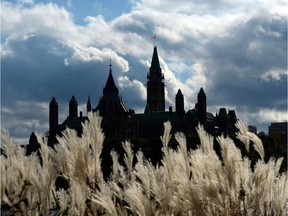 Parliament Hill in Ottawa is viewed from the shores of Gatineau, Quebec on Oct. 22, 2013.