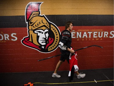Patrick Wiercioch heads back to the dressing after shooting promos as the Ottawa Senators are given medicals and tested for strength and conditioning.
