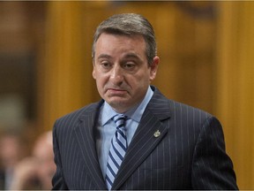 Parliamentary Secretary Paul Calandra speaks in the House of Commons during question period in Ottawa on Friday, Sept. 26, 2014.