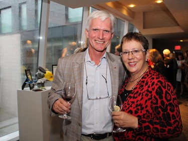 Peter Charbonneau and Joan Charbonneau at a reception for Hospice Care Ottawa held Wednesday, Sept. 27, 2014, at the penthouse level of 700 Sussex Drive.