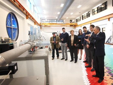 Professor of Earth Sciences Ian Clark gives a tour of the newly acquired Accelerator Mass Spectrometer at the University of Ottawa's Advanced Research Complex on September 30, 2014 during the official opening.